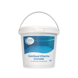 A white container labeled with the product name "Stabilised Chlorine Granules" for pools and spas, containing 5 kg of Sodium Dichloroisocyanurate. It includes an image of a blue pool and comes with a convenient carrying handle.
