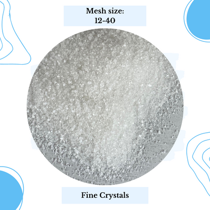 A close-up circular image highlights the fine white crystals of Citric Acid with a mesh size ranging from 12 to 40. Against a backdrop of abstract blue shapes that underscore its function as a natural cleaning agent, text above states "Mesh Size: 12-40" and below the circle reads "Fine Crystals.